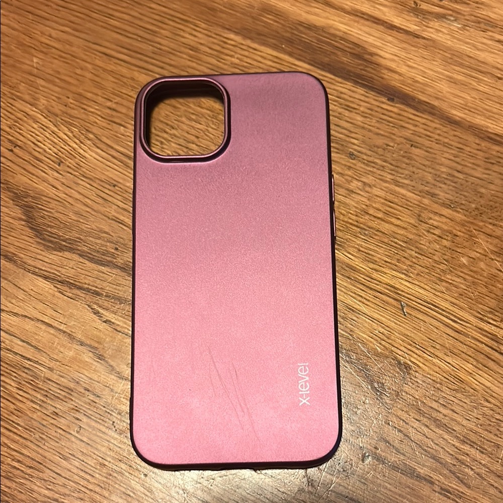 Wine red ultra slim iPhone 14 case. Wireless charging compatible